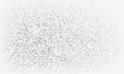 Abstract halftone dot background in grayscale creating a soft gradient and modern texture.