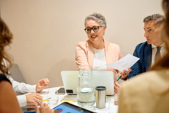 Businesswoman presenting data during an office meeting