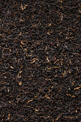 Fresh Black Tea Leaves with Dried Flowers and Fruit Macro Shot