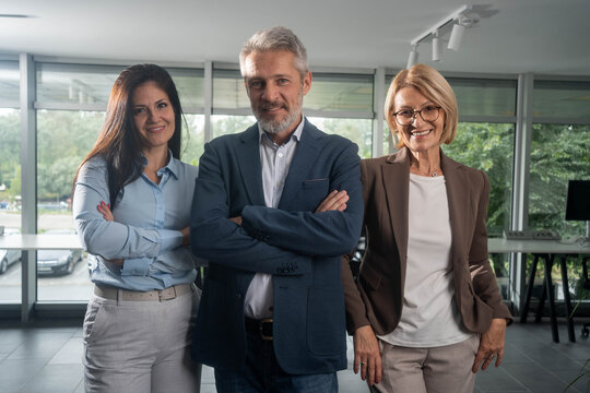 Portrait, group and business people in office, investment and diversity with confidence, finance advisor and smile. Face, accounting and employees in workplace, partnership and support with pride