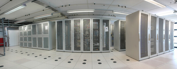 Server room with rack servers and cabinets for internet and connectivity