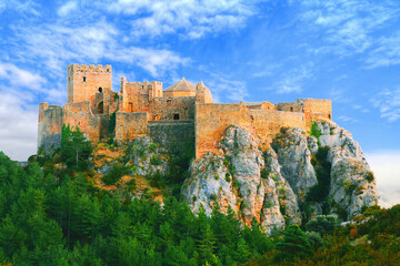 Obraz premium Loarre Castle is a Romanesque fortress located in the province of Huesca, Spain, near the Pyrenees Mountains. 