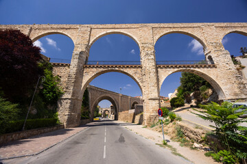 Fototapeta premium Los Arcos de TERUEL aqueduct spanning historic Calle San Martin in Spain