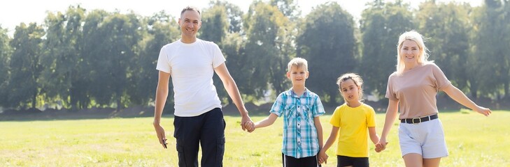 Family, happy outdoor with love for bonding, weekend fun and games in nature with sunshine. Parents, kids and carry on back for summer activity, forest scenery or smile on morning walk