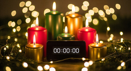 Timer with candles and fairy lights at festive background
