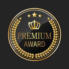 Premium award. Realistic round medal with a golden crown and a laurel wreath isolated on a black background. 