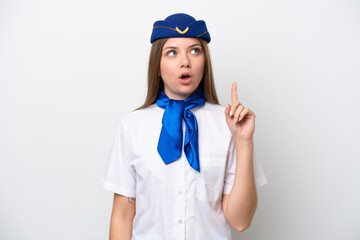 Airplane Lithuanian woman stewardess isolated on white background thinking an idea pointing the finger up