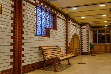 Historic Budapest Metro Station Interior with Vintage Tiles and Bench