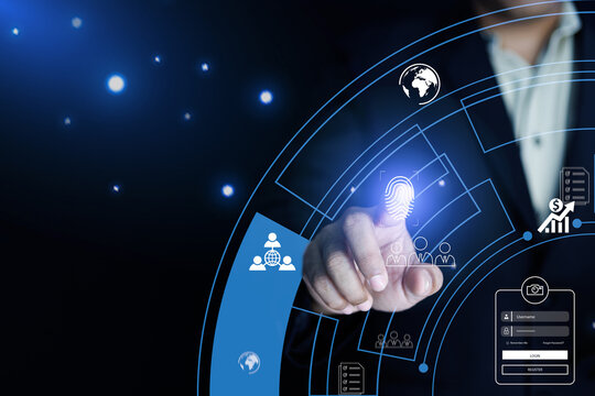 A businessman interacts with a futuristic digital interface,showcasing the application of artificial intelligence (AI) in modern workplaces.This conceptual image represents innovation, data analytics. - Powered by Adobe