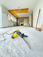 Electric Jackhammer Breaking Concrete with Rebar