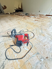 Electric Jackhammer Breaking Concrete with Rebar