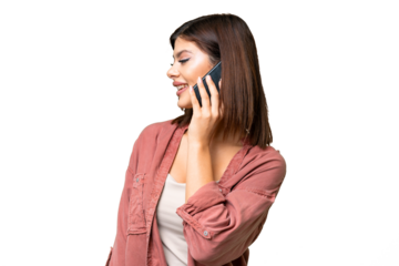 Young Russian woman over isolated chroma key background keeping a conversation with the mobile phone with someone