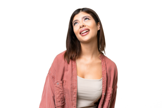 Young Russian woman over isolated chroma key background laughing
