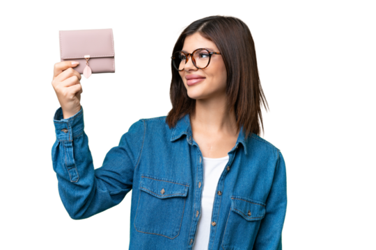 Young Russian woman holding a wallet over isolated chroma key background with happy expression