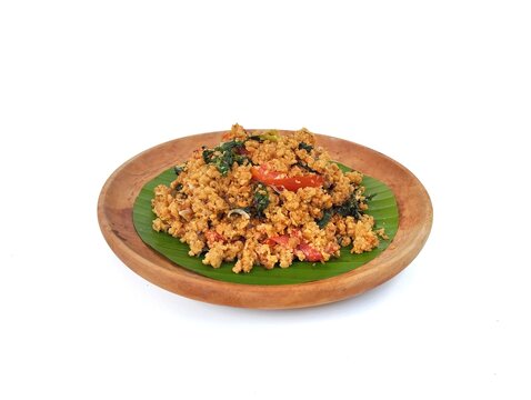 Oseng-oseng oncom or Stir-fried fermented soybeans on plate, High angle view, indonesian typical food	