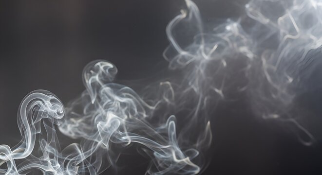 Elegant wisps of white smoke create a calming abstract atmosphere