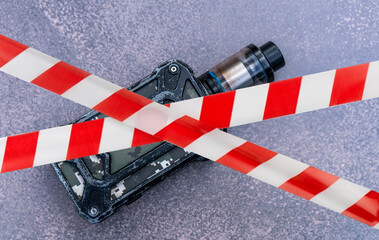 Prohibition of vapes and electronic cigarettes.The device for smoking liquid is crossed out with a red stripe.The danger of vaping.