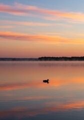 A placid lake surface at sunrise, reflecting the gentle hues of the sky, offering a profoundly calming natural vista ,golden hour ,still ,natural landscape