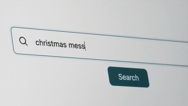 Christmas Messages Search on Search Engine. Close Up Shot of Typing Search Term in Search Box on Web Page on Computer Screen. Real Time 4K.