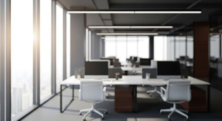 Fototapeta premium Modern open office space with computers and natural light with blurred background.