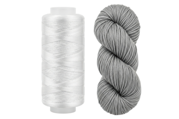Spool of white thread and a skein of gray wool knitting yarn isolated on transparent background