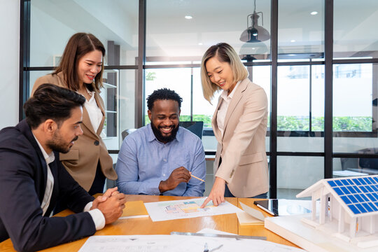team of multiethnic colleague discuss budget performance planning, sharing idea for cost reduction, business people man woman diverse employee coworker in formal suit meeting in finance office