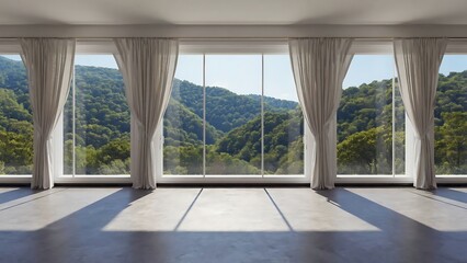 Bright and airy room with large windows offering a stunning view of lush green mountains and a clear blue sky on a sunny day