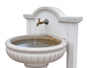 Elegant outdoor wall-mounted stone fountain with a brass spigot and flowing water, designed for garden or courtyard decoration