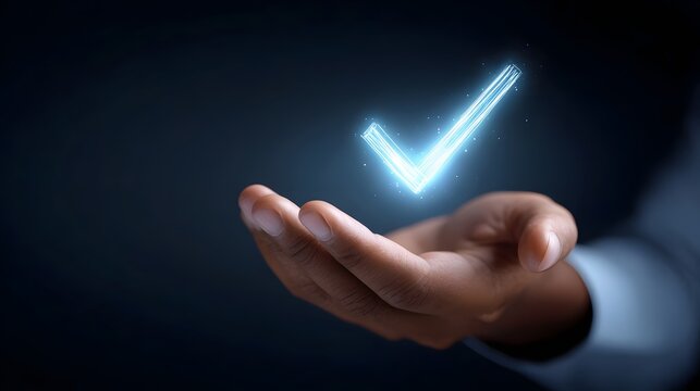 A dark skinned hand cradles a bright neon blue checkmark that glows symbolizing successful completion verified status and future technology