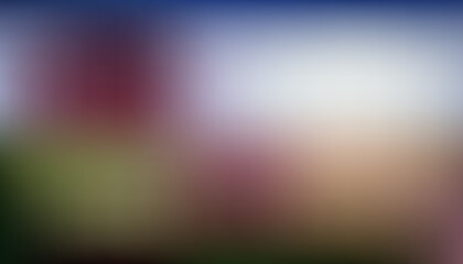 Abstract blurred flower field under blue sky at sunrise, colorful spring landscape background with copy space, soft bokeh gradient backdrop.