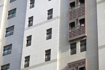 Elegant architecture featuring intricate window designs in Middle Eastern style