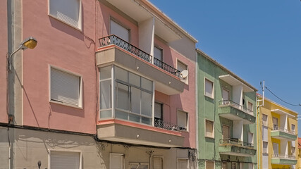 detail of pastel colored apartment houses in Lisbon, Portugal