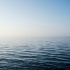Obraz premium Abstract, infinite seascape where the smooth ocean merges seamlessly with the hazy, blank sky on a distant, fluid horizon line ,ethereal ,sea ,template