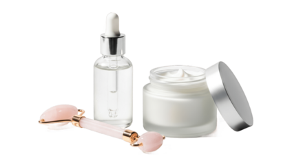 Elegant skincare set with silver-capped serum dropper bottle, face cream jar, and pink jade roller, isolated on white background, ideal for beauty, spa, and personal care branding, PNG image.