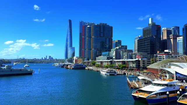 8 November 2025 Darling Harbour on Parramatta River Sydney Harbour on a warm spring blue sky day in Sydney NSW Australia Restaurants Cafes Hight rise hotels and office towers
