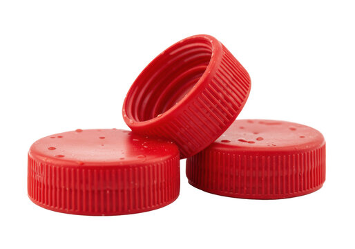 Extreme macro close-up of three hyper-detailed, scuffed red hdpe bottle caps revealing screw threads on a transparent background, concept of recycling and plastic waste awareness