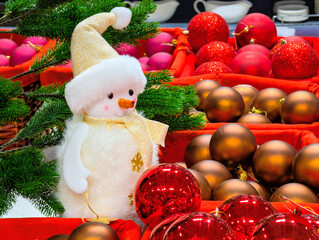 Snowman and Christmas tree decorations in a supermarket