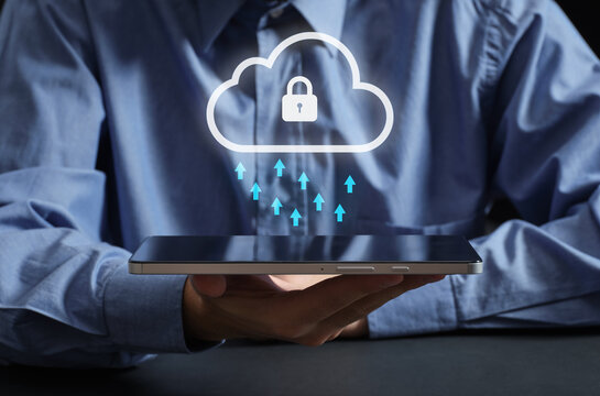 Person holding tablet uploading data to secured cloud