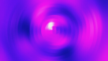 Abstract circular gradient with pink and purple hues creating a soft blurred effect