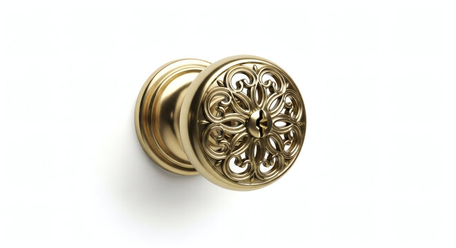 Close up of an ornate gold door knob against a white background view