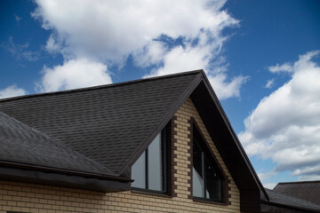 Soft roof, flexible shingles. Installation of soft tiles on the roof.