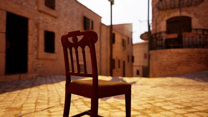 A red wooden chair rests in the center of a narrow cobblestone alley, bathed in the warm glow of sunset. Quiet buildings surround the chair, creating a peaceful, contemplative atmosphere.
