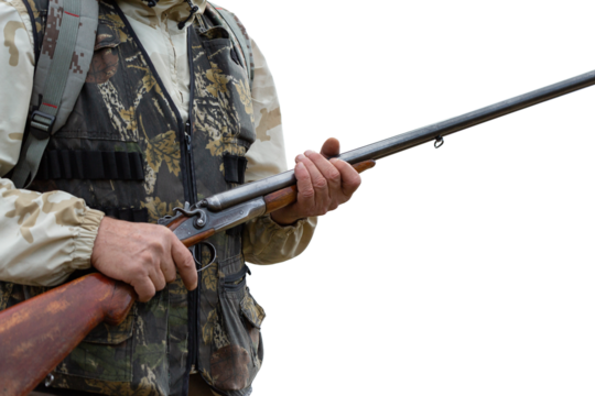 Close-up of a hunter's hand with a gun. Medium shot of a hunter with a weapon.