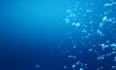 Deep blue ocean water background with light and bubbles creates a serene underwater winter sea texture pattern