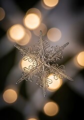 Merry Christmas closeup of isolated snowflake ornament with bokeh background, ideal for elegant winter invitation or festive flyer. Copy space area