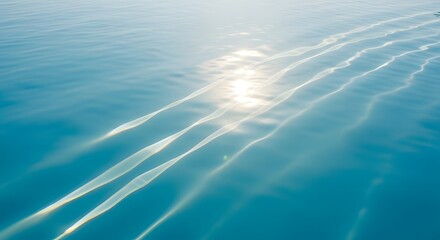 Sunlight reflecting on the surface of the ocean creating bright streaks on the water surface