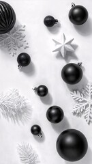 Minimalist Modern Christmas Composition with Black and White Ornaments