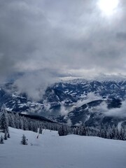 lake with snow-covered mountains