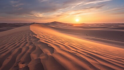 Stunning sunset paints the majestic desert dunes in warm golden light, creating a serene and peaceful landscape perfect for travel and adventure inspiration
