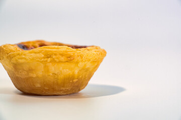 Delicious Portuguese Egg Tart on a White Background